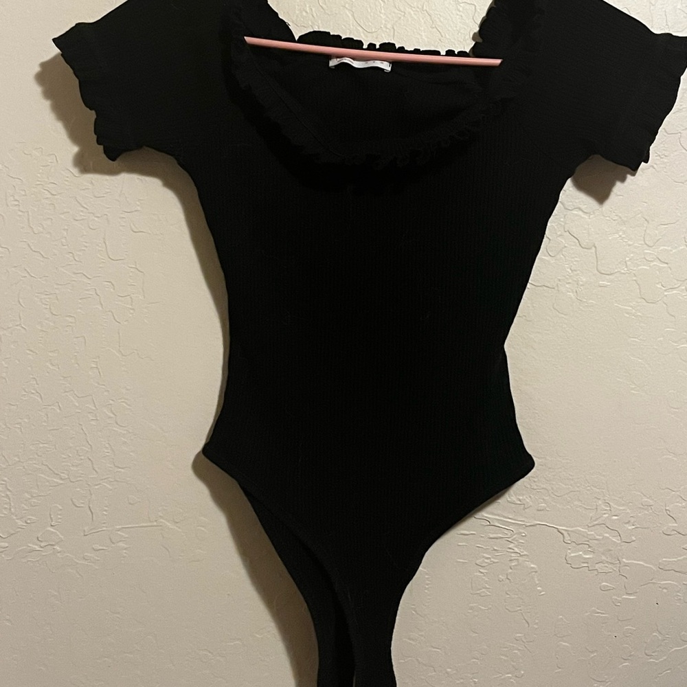 black and pink off shoulder body suits